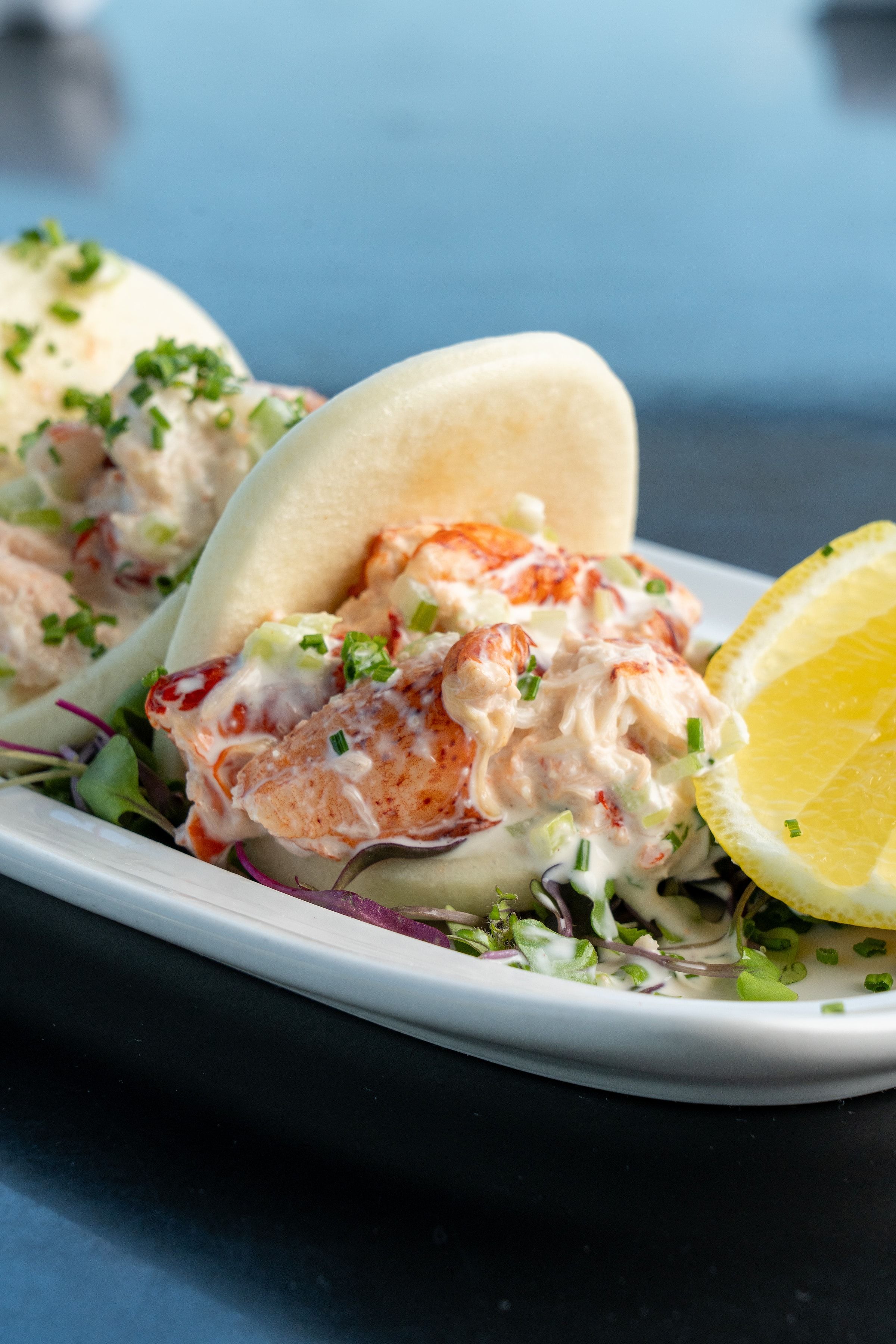 River Dock lobster bao bun with chives and lemon
